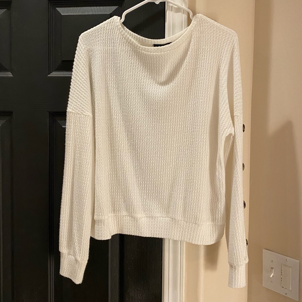 White ribbed sweater